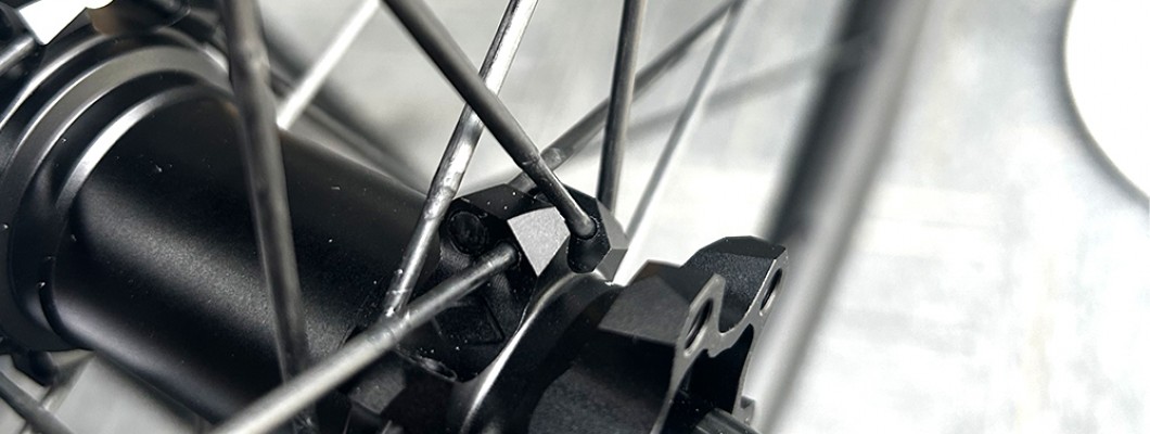 Research and development progress of carbon fiber spokes